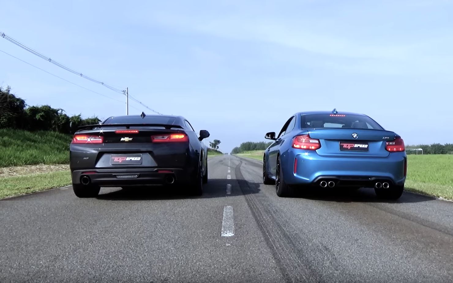 Βίντεο: Chevrolet Camaro SS 50th Anniversary εναντίον BMW M2